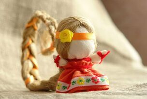 doll amulet for luck